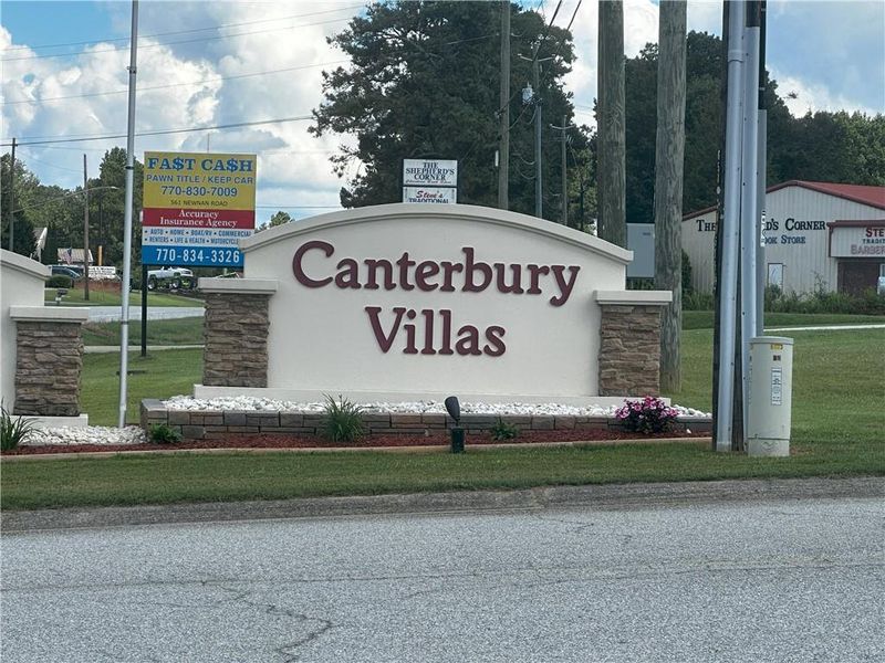 Front exterior of a new home in Canterbury Villas, Carrollton, GA, highlighting curb appeal (Image 2).