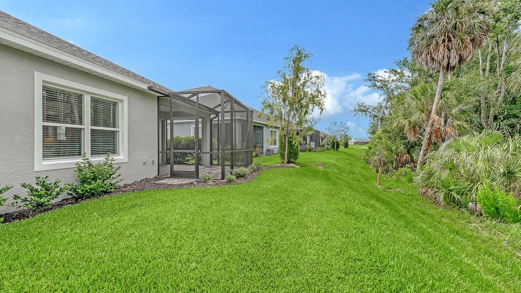 Exterior details and patio area of a home in Wildleaf Real Estate and Homes for Sale in Parrish, FL - Neal Communities, Parrish (Image 19). Exterior details and patio area of a home in Wildleaf Real Estate and Homes for Sale in Parrish, FL - Neal Communities, Parrish (Image 19).