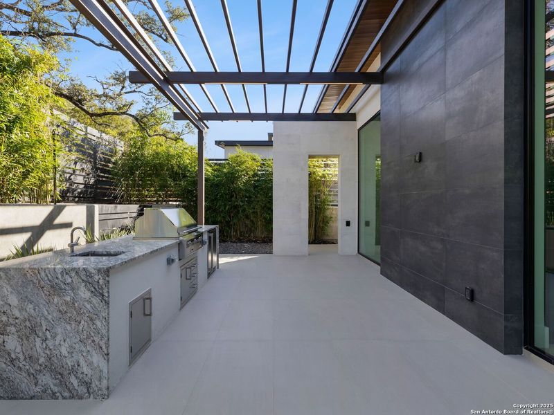 Exterior details and patio area of a home in , San Antonio (Image 32).
