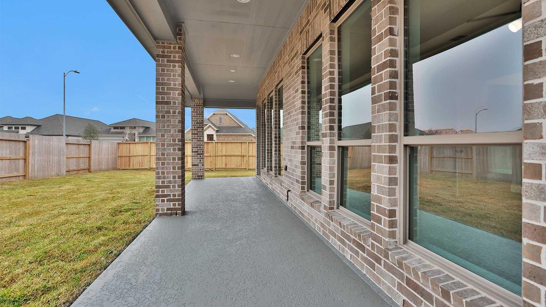 Exterior details and patio area of a home in Marvida, Cypress (Image 3).