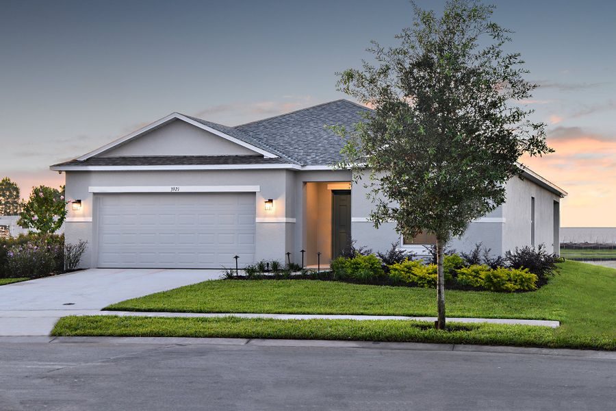 Representative exterior photo of a completed home built from the Goldfinch by Taylor Morrison in Solena, North Fort Myers, FL (Image 15).