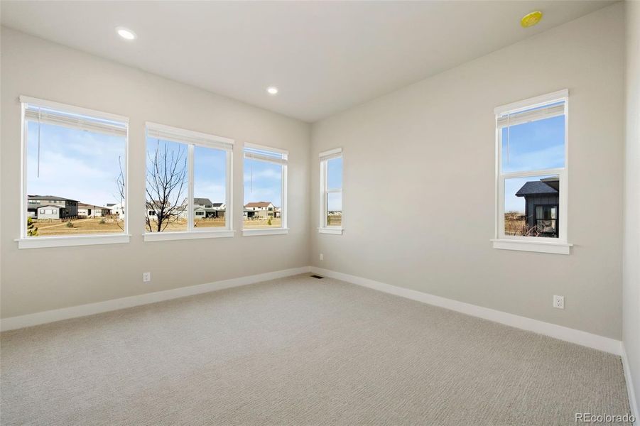Spacious, unfurnished interior of a new home in Kitchel Lake at Serratoga Falls, Timnath (Image 11).