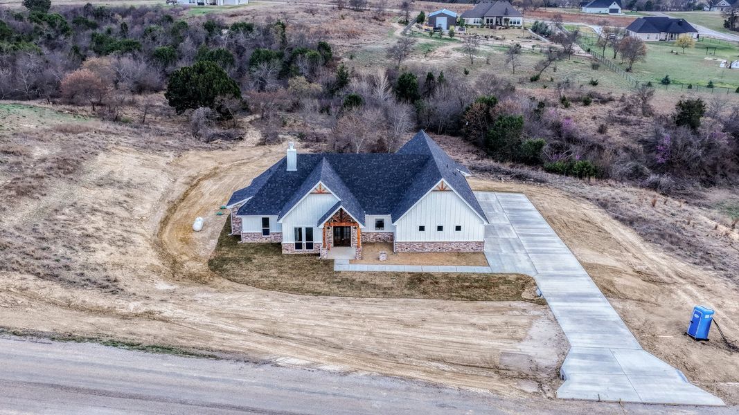 Representative exterior photo of a completed home built from the Ava by Zeal Home Builders in Patti Lynn Hills, Paradise, TX (Image 27).