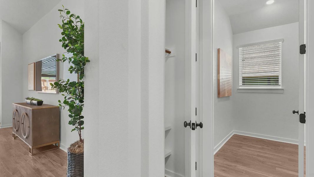 Representative furnished interior of a home built from the Brooks by Chesmar Homes in University Heights, Round Rock (Image 9).