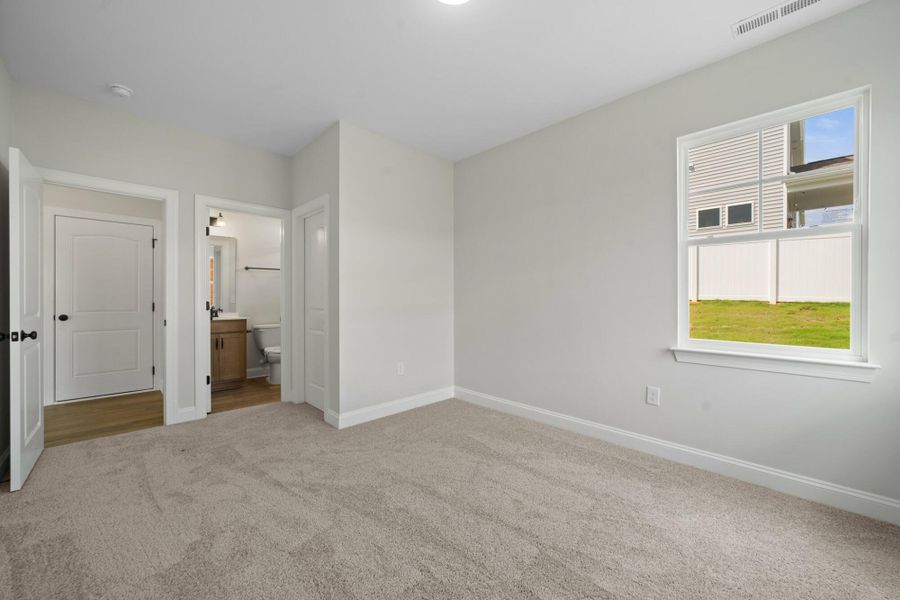 Spacious, unfurnished interior of a new home in Cottages at Piper Village, Trinity (Image 19).