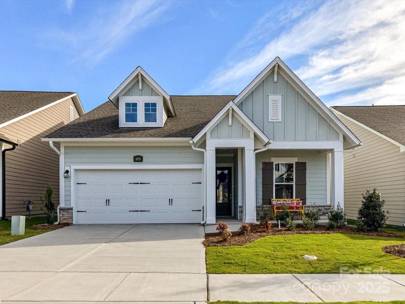 Front exterior of a new home in Encore at Streamside - Classic Series, Waxhaw, NC, highlighting curb appeal (Image 24).