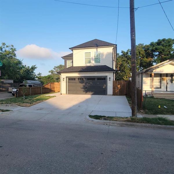 View of front property with a garage