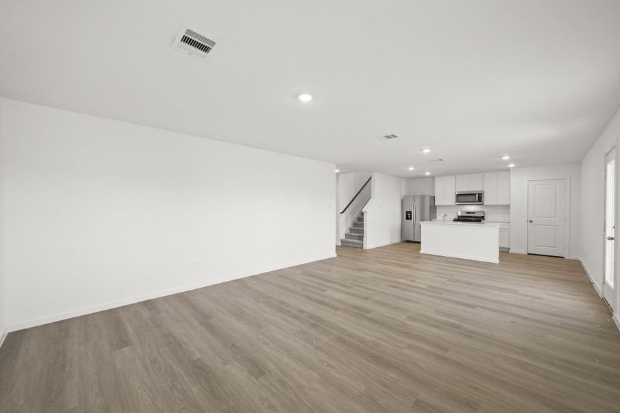 Spacious, unfurnished interior of a new home in Sunterra, Katy (Image 6). Spacious, unfurnished interior of a new home in Sunterra, Katy (Image 6).