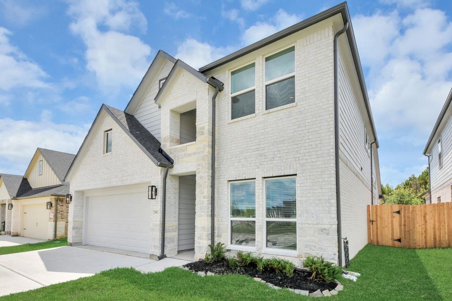 Home features a convenient 2-car garage complemented by a spacious driveway, offering ample parking for you and your guests. Home features a convenient 2-car garage complemented by a spacious driveway, offering ample parking for you and your guests.