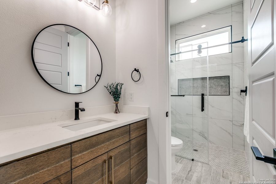 Furnished interior view inside a new home in , Mico (Image 10).