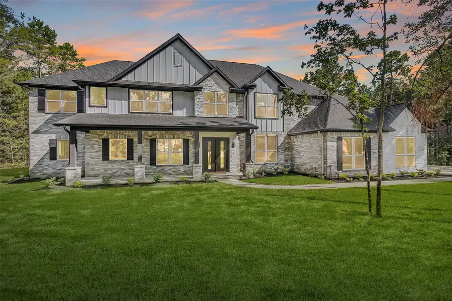 Welcome to 8604 Trinity Pines—a stunning custom luxury homenestled on 1.5 acres in theprestigious High MeadowEstates.