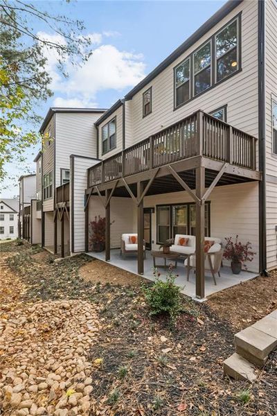 Exterior details and patio area of a home in Parkside at Mason Mill, Decatur (Image 23).
