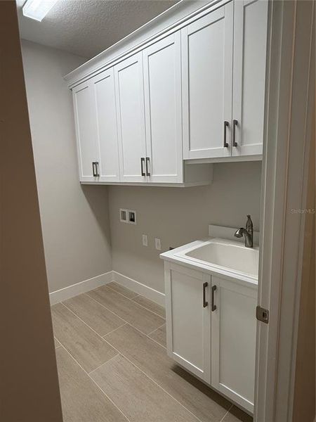 Furnished interior view inside a new home in Shellstone at Waterside, Sarasota (Image 1).