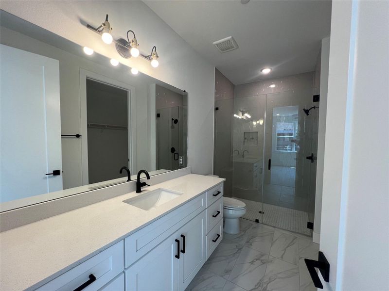 Furnished interior view inside a new home in The Grove, Austin (Image 13). Furnished interior view inside a new home in The Grove, Austin (Image 13).