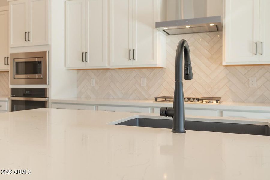 Tri Pointe Soleo 213 - Kitchen-2MLS