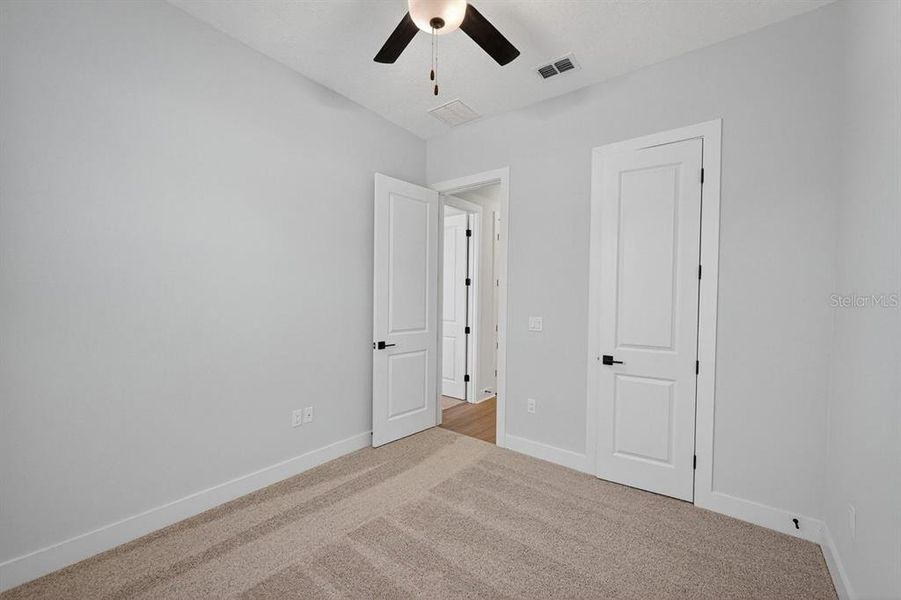 Spacious, unfurnished interior of a new home in Stables at Cary Forest, Bryceville (Image 32).