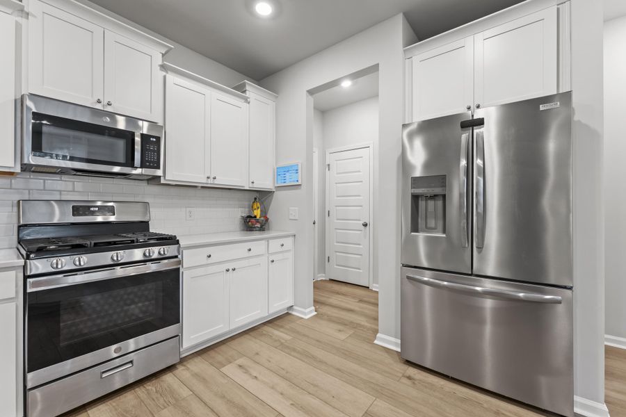Furnished interior view inside a new home in Lindera Preserve at Cane Bay Plantation: Arbor Collection, Summerville (Image 22).
