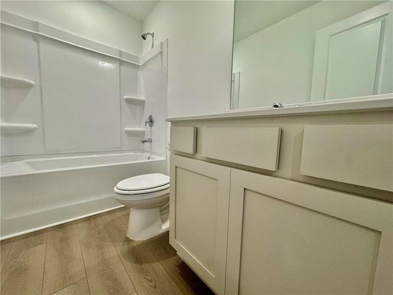 Furnished interior view inside a new home in Eastlyn Crossing, Flowery Branch (Image 9).