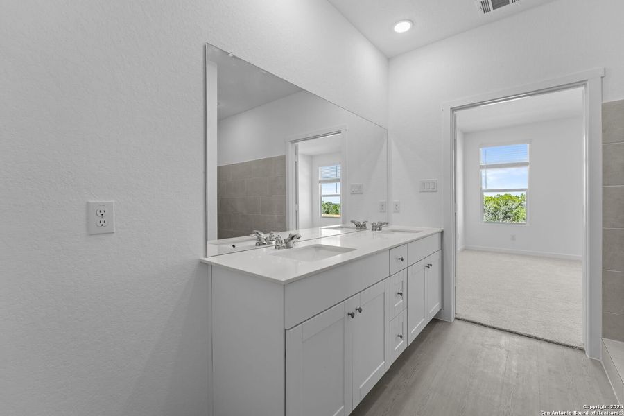 Furnished interior view inside a new home in Waterwheel: Coastline Collection, San Antonio (Image 4).