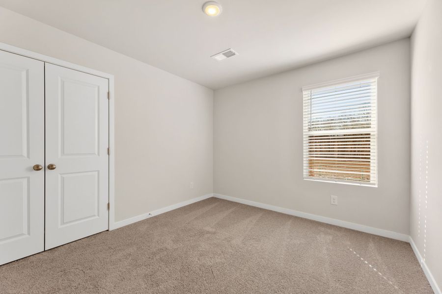 A room with white doors.