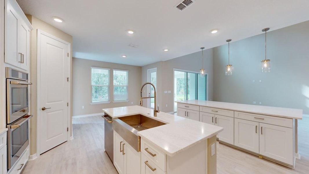 Representative furnished interior of a home built from the Barbuda by Taylor Morrison in Headwaters at Lofton Creek, Yulee (Image 8).