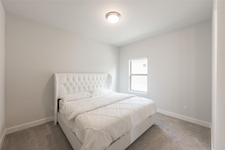 Furnished interior view inside a new home in Elyson, Katy (Image 37).