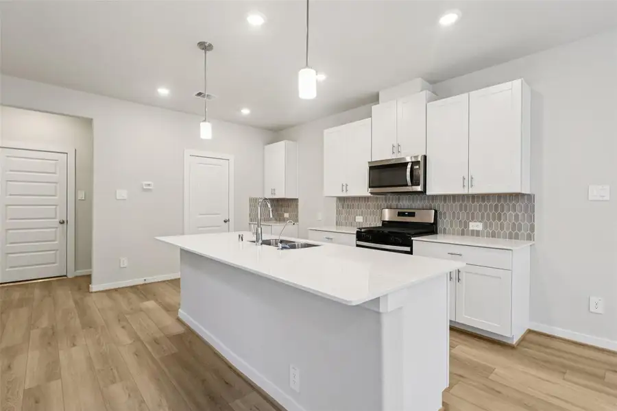Furnished interior view inside a new home in Pinewood Trails - City Series, Atascocita (Image 7).