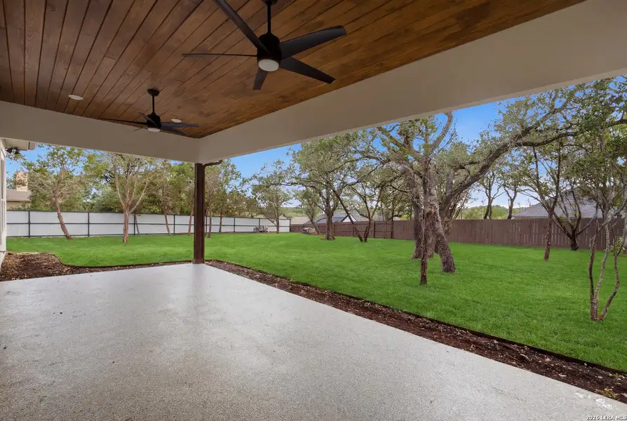 Exterior details and patio area of a home in , Fischer (Image 2). Exterior details and patio area of a home in , Fischer (Image 2).