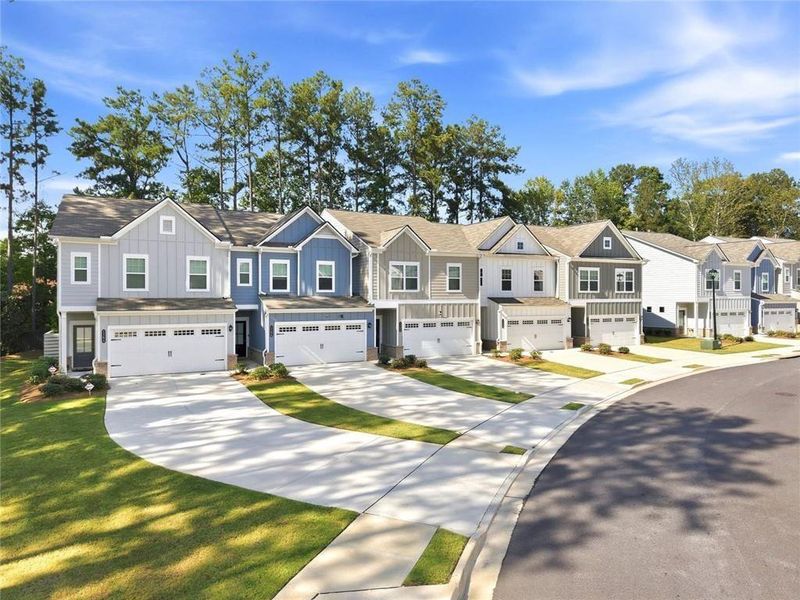 Front exterior of a new home in , Sugar Hill, GA, highlighting curb appeal (Image 2). Front exterior of a new home in , Sugar Hill, GA, highlighting curb appeal (Image 2).