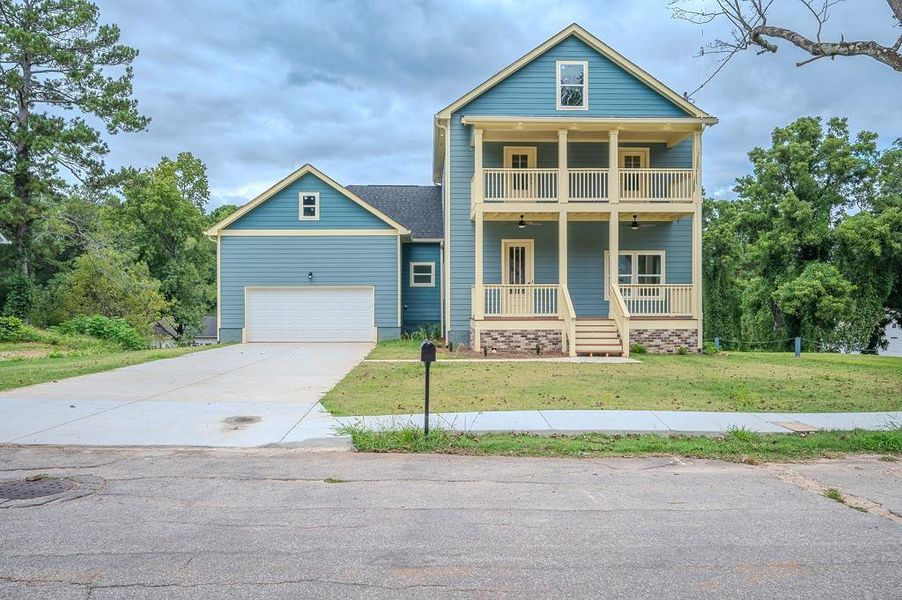 Front exterior of a new home in , Atlanta, GA, highlighting curb appeal (Image 15).