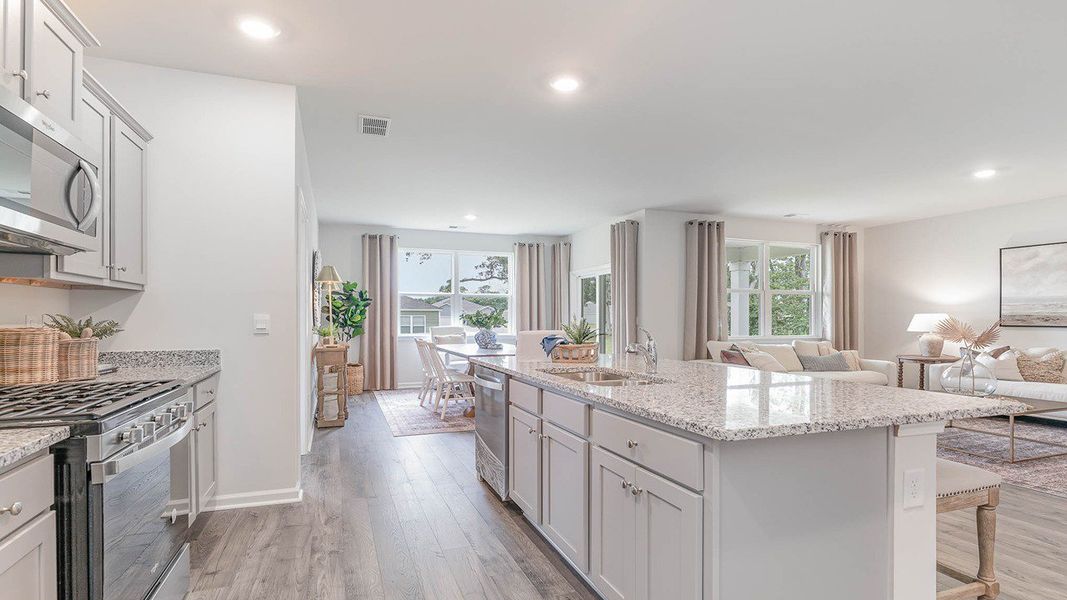 Representative furnished interior of a home built from the ARIA by D.R. Horton in Harper Meadows, Loris (Image 14).