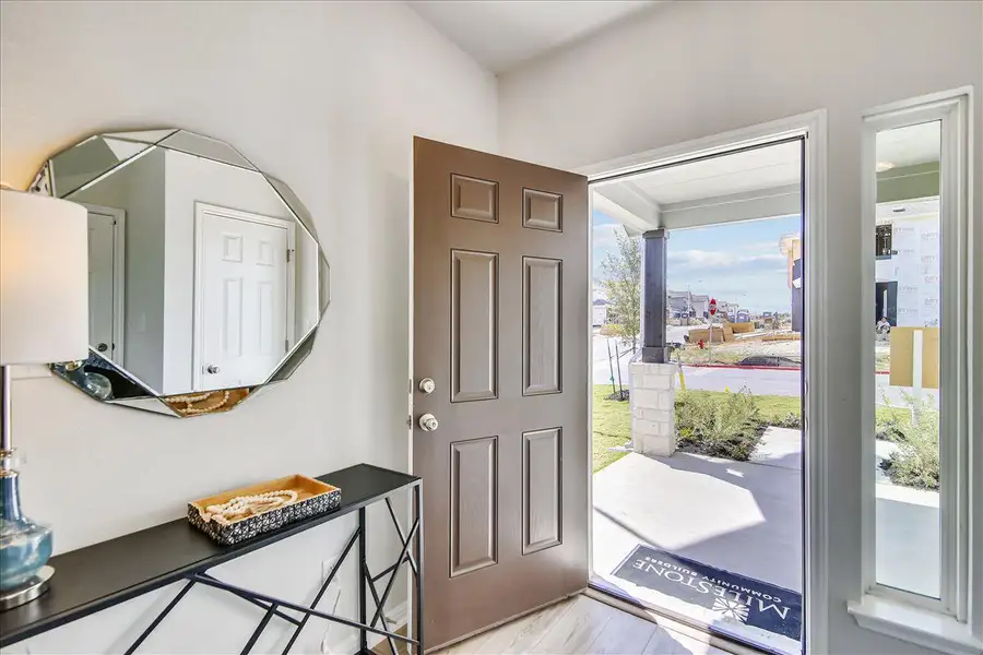 Furnished interior view inside a new home in Crosswinds, Kyle (Image 6).