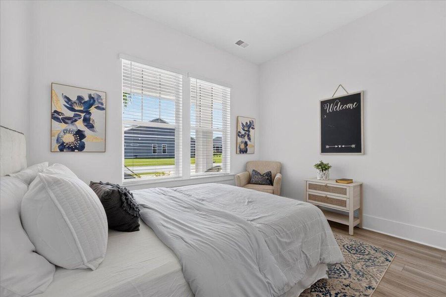 Furnished interior view inside a new home in Summerwind Crossing at Lakes of Cane Bay, Summerville (Image 36).