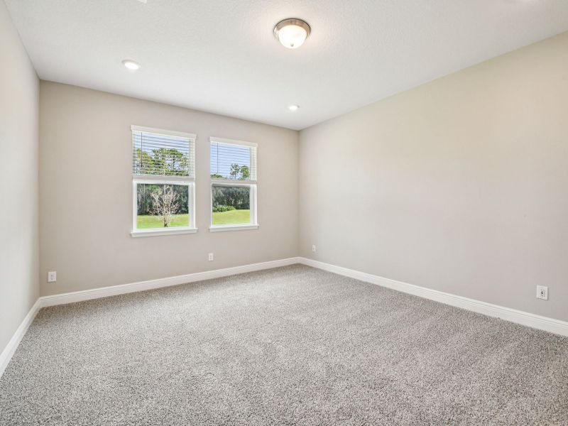 Spacious, unfurnished interior of a new home in Ridgehaven - Signature Series, Ormond Beach (Image 11).