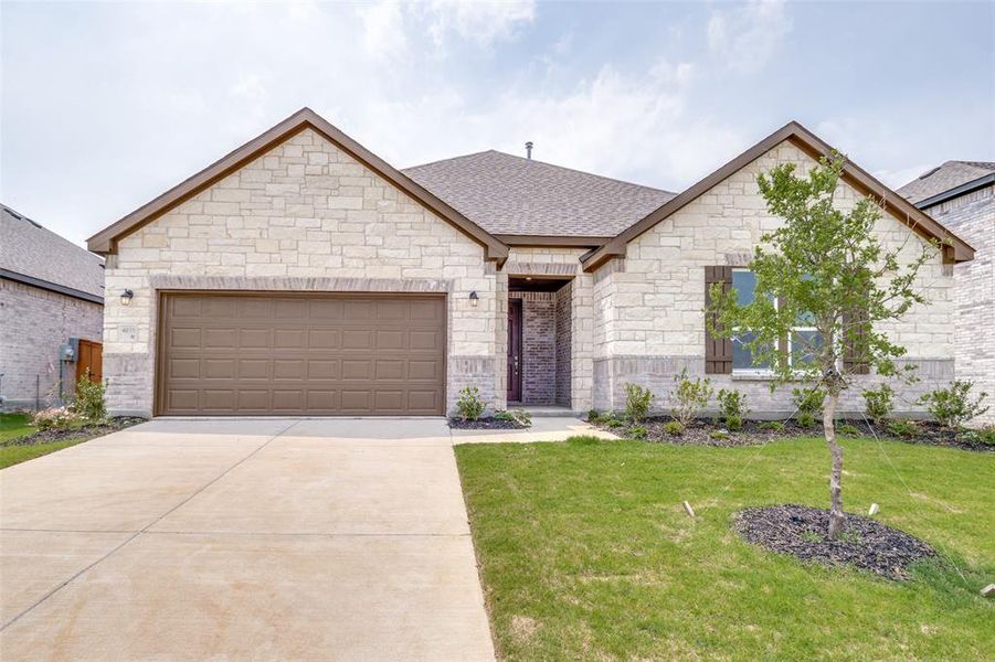 Front exterior of a new home in , Crandall, TX, highlighting curb appeal (Image 16). Front exterior of a new home in , Crandall, TX, highlighting curb appeal (Image 16).