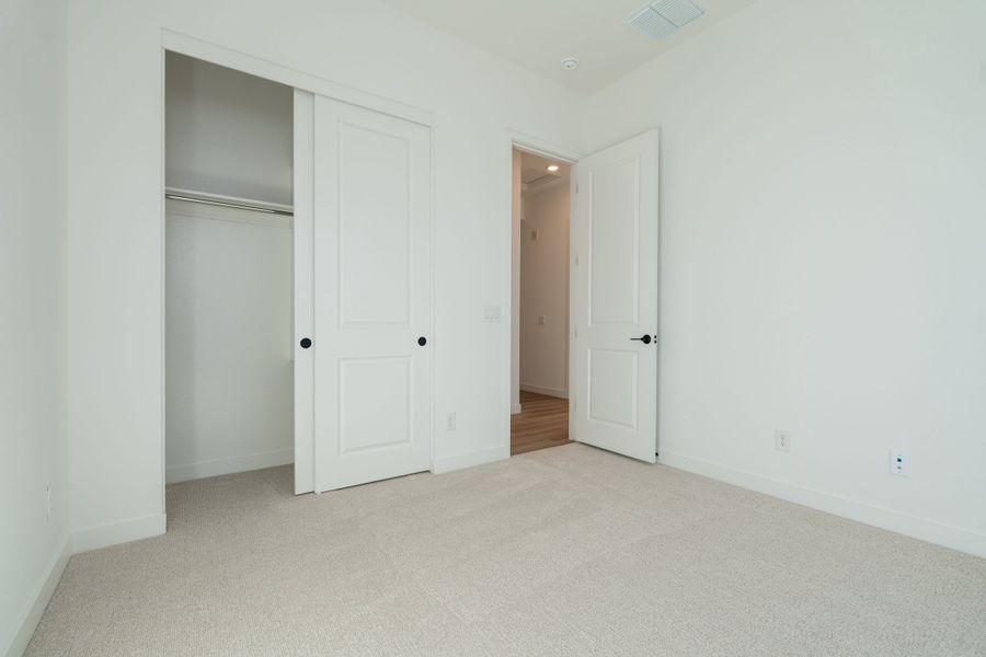 Spacious, unfurnished interior of a new home in Waterston Central, Gilbert (Image 14).
