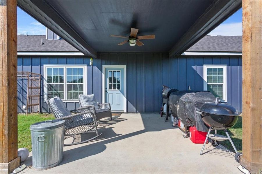 View of patio / terrace featuring a ceiling fan and a grill