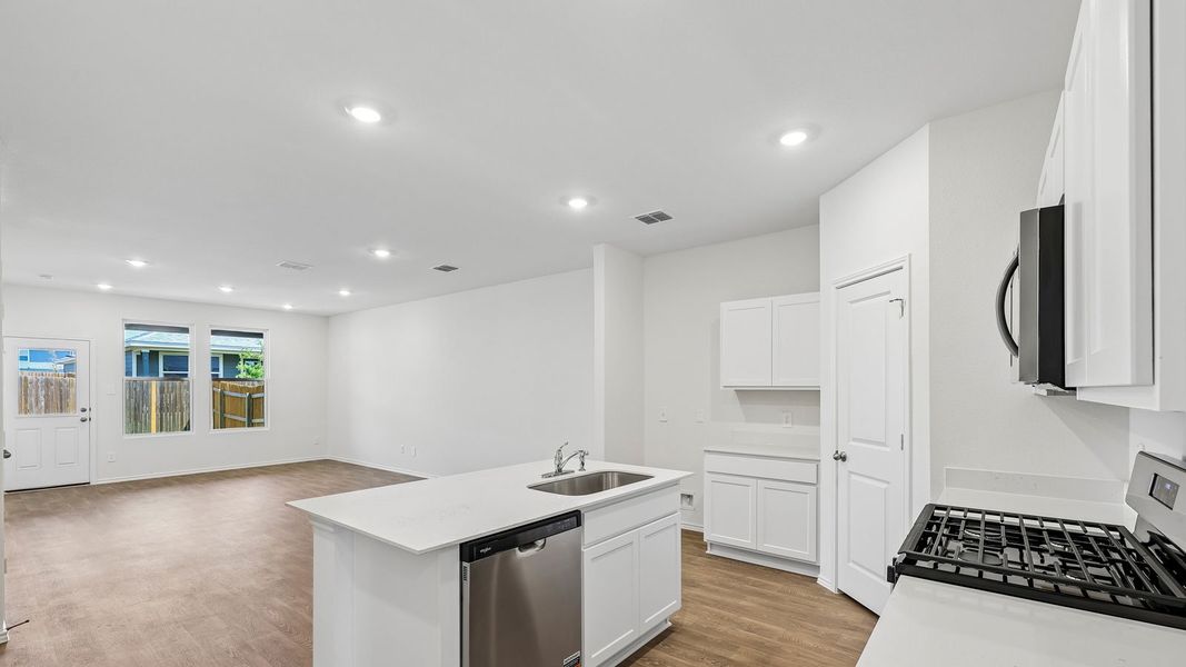 Furnished interior view inside a new home in Wayside, Uhland (Image 9).