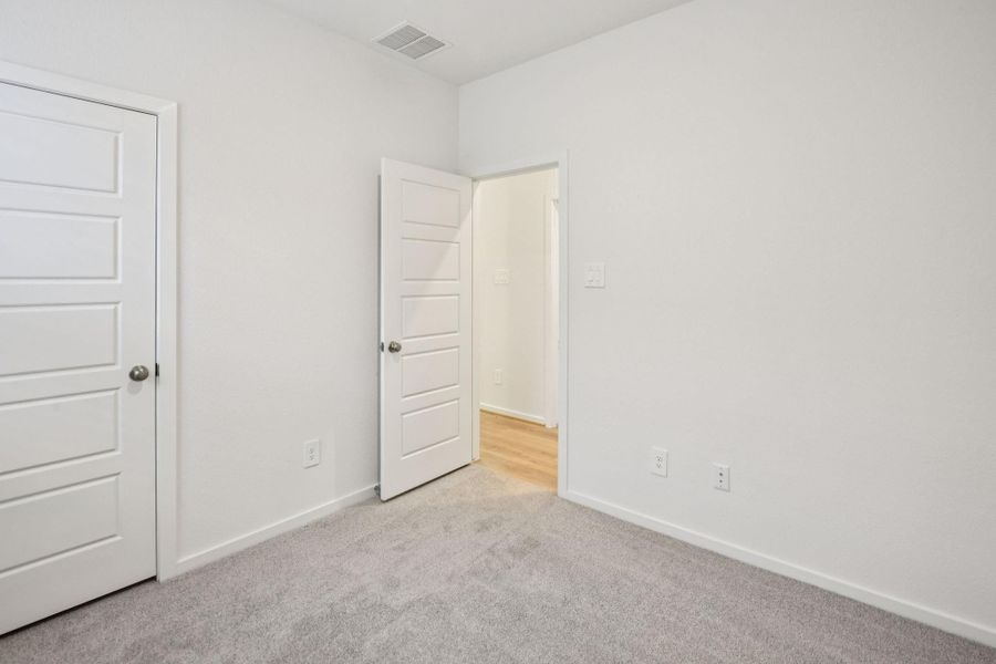 Spacious, unfurnished interior of a new home in Riviera Pines - Traditional Series, Huffman (Image 25).