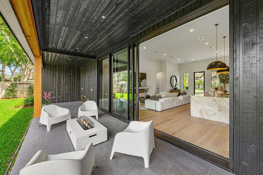 Covered Patio is quite large w/ space to install a summer kitchen in the back. Perfect for entertaining and enjoying your own back yard oasis.