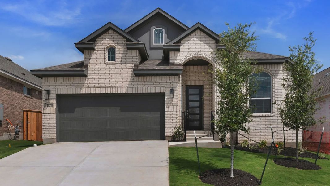 Representative exterior photo of a completed home built from the Lucas by Chesmar Homes in Highland Village, Georgetown, TX (Image 1). Representative exterior photo of a completed home built from the Lucas by Chesmar Homes in Highland Village, Georgetown, TX (Image 1).