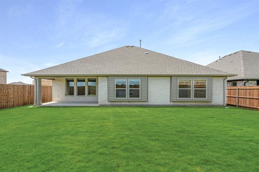 Exterior details and patio area of a home in Wildflower Ranch 60-65, Justin (Image 24). Exterior details and patio area of a home in Wildflower Ranch 60-65, Justin (Image 24).