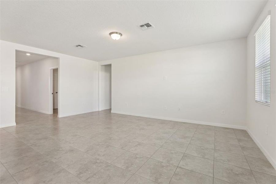 Spacious, unfurnished interior of a new home in Lawson Dunes - Signature Series, Haines City (Image 20).