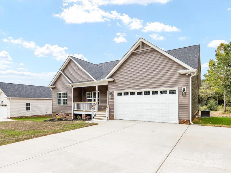 Front exterior of a new home in , York, SC, highlighting curb appeal (Image 25). Front exterior of a new home in , York, SC, highlighting curb appeal (Image 25).