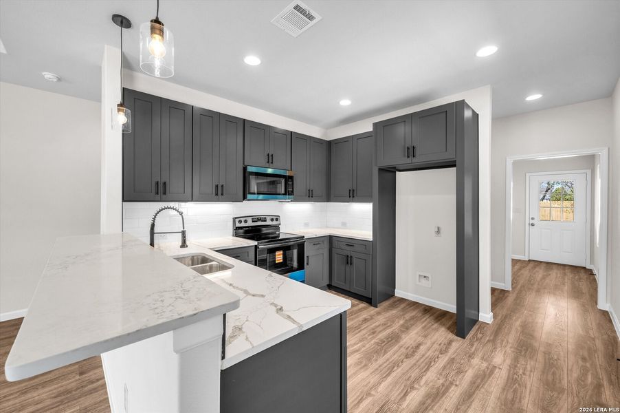 Furnished interior view inside a new home in , San Antonio (Image 6).