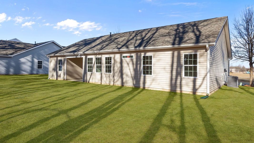 Exterior details and patio area of a home in Tyler - Home on the Lake, New Bern (Image 24).
