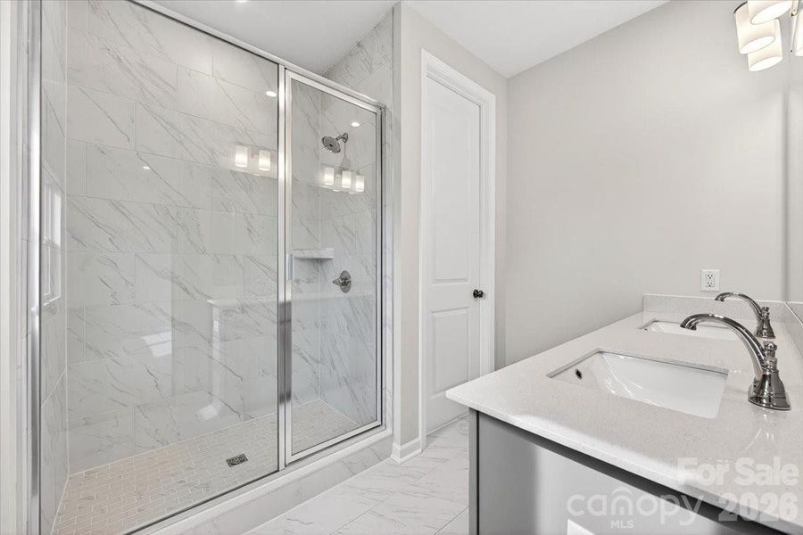 Primary tiled walk-in shower Primary tiled walk-in shower