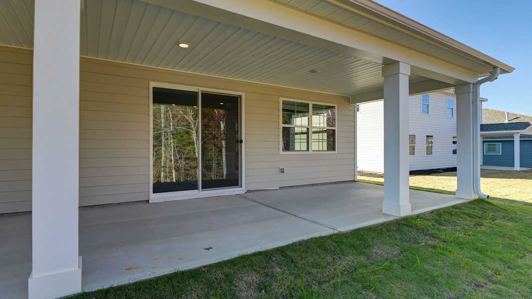Exterior details and patio area of a home in Livingston Woods, Irmo (Image 24).