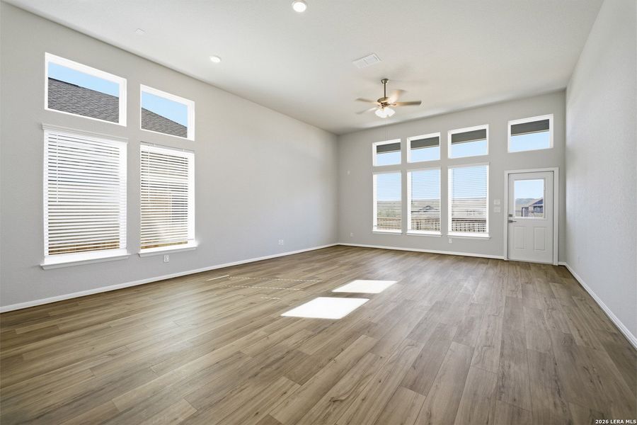 Spacious, unfurnished interior of a new home in The Woodlands at Medina Hills, Mico (Image 28).