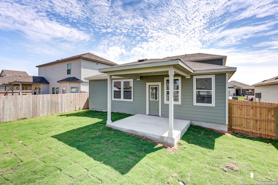 Front exterior of a new home in Cinco Lakes, San Antonio, TX, highlighting curb appeal (Image 21). Front exterior of a new home in Cinco Lakes, San Antonio, TX, highlighting curb appeal (Image 21).